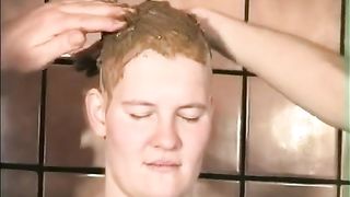 Smearing poop on her bald head