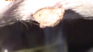 Blonde milf pooping in close up