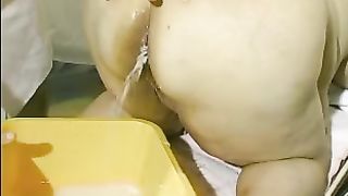 Fisting a fat slut after she finished pooping