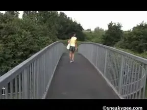 Sexy ebony girl peeing outdoor