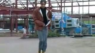 Gipsy girl peeing in a public place