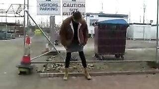 Gipsy girl peeing in a public place