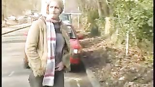 Blonde girl peeing outdoor