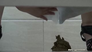 Spying on a Chinese woman that's pooping