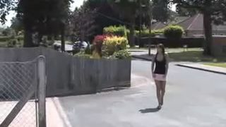 Beautiful brunette peeing under bridge