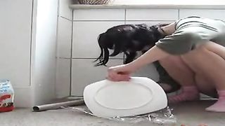 Shaved girl pooping on a plate