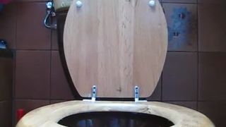 Tattooed girl shitting