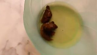 Pooping a big one in close up