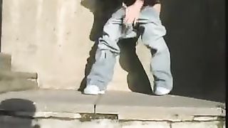 Vintage video of a blonde girl peeing