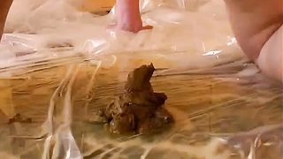 Hairy girl shitting in close up