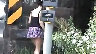 Busty babe went to pee in public