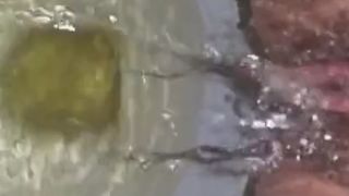 Attractive slut enjoys pissing gangbang action