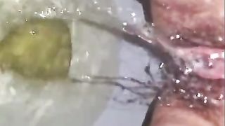 Attractive slut enjoys pissing gangbang action