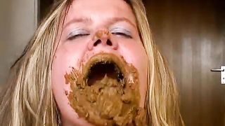 Blonde babe smears crap on her face