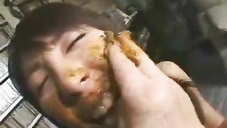 Japanese teen eating poop from a white plate