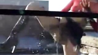 Sexy young girl peeing on window