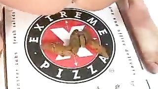 Pretty slut shitting on a pizza box