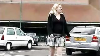 Blonde babe peeing near parking lot