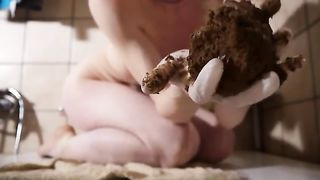 Sexy babe playing with her poop