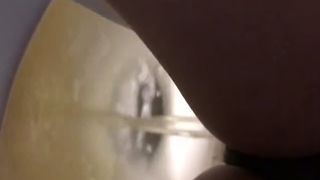 Hairy babe records herself while pooping and peeing