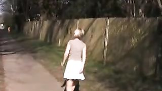 Peeing in white skirt