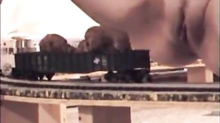 Shitting on a moving train toy