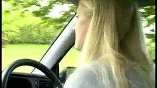 Blonde babe peeing from her car