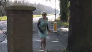 Emo girl peeing behind a tree