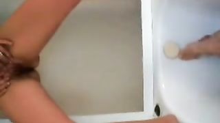 Hairy milf peeing on husbands dick