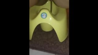 Fat mother shitting in a potty