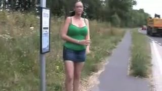 Busty babe peeing outdoor
