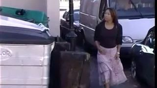 Sexy Japanese girls peeing in a parking lot