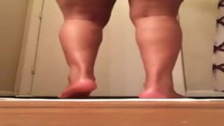 Tall ebony girl pooping while standing