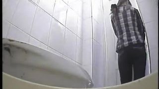 Pooping and peeing in a dirty public bathroom