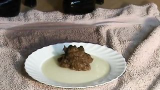 Shaved girl shitting on a white plate