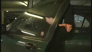 Amateur girl peeing behind parked car