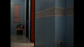 Oriental girl fisting her ass