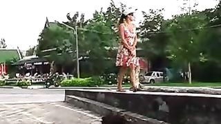 Blonde babe peeing in public