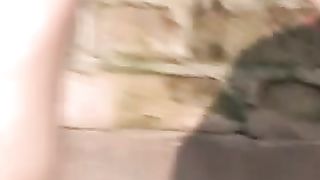 Red haired cutie peeing outdoor