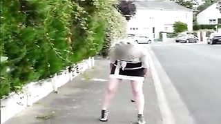 Mature woman shitting in the streets