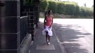 Curly hair peeing outdoor