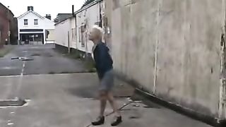 Punk girl peeing in public