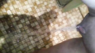 Girl with pumped pussy peeing