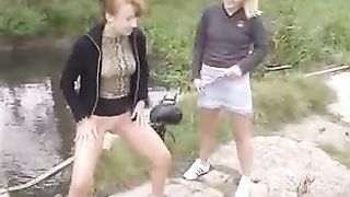 Two hot girls peeing in their panties