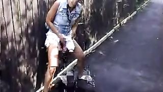 Shameless girl peeing in public