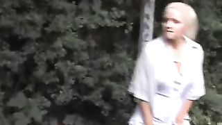 Small slut peeing in the streets