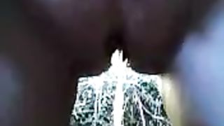 Fat girl peeing on a field