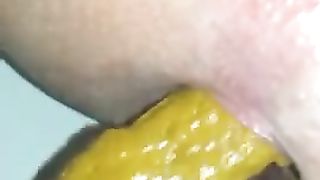 Shaved wife shitting in close up