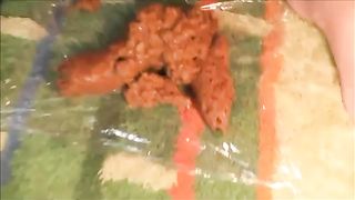 Shaved girl pooping in close up