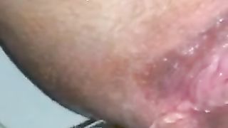 Close up of amateur girl pooping in toilet